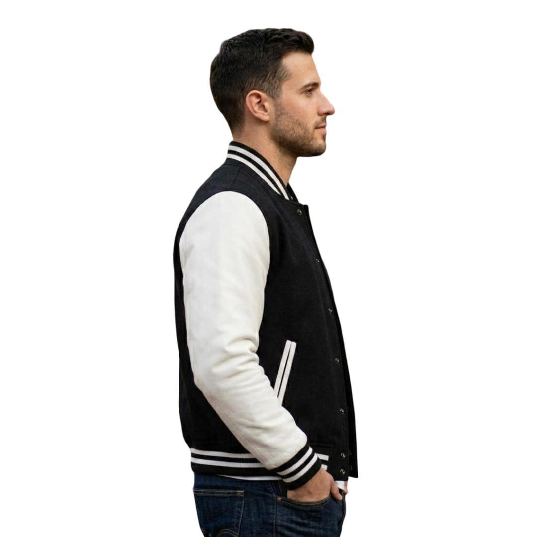 Side view of men black and white varsity jacket showing contrast white sleeve and ribbed hem detail