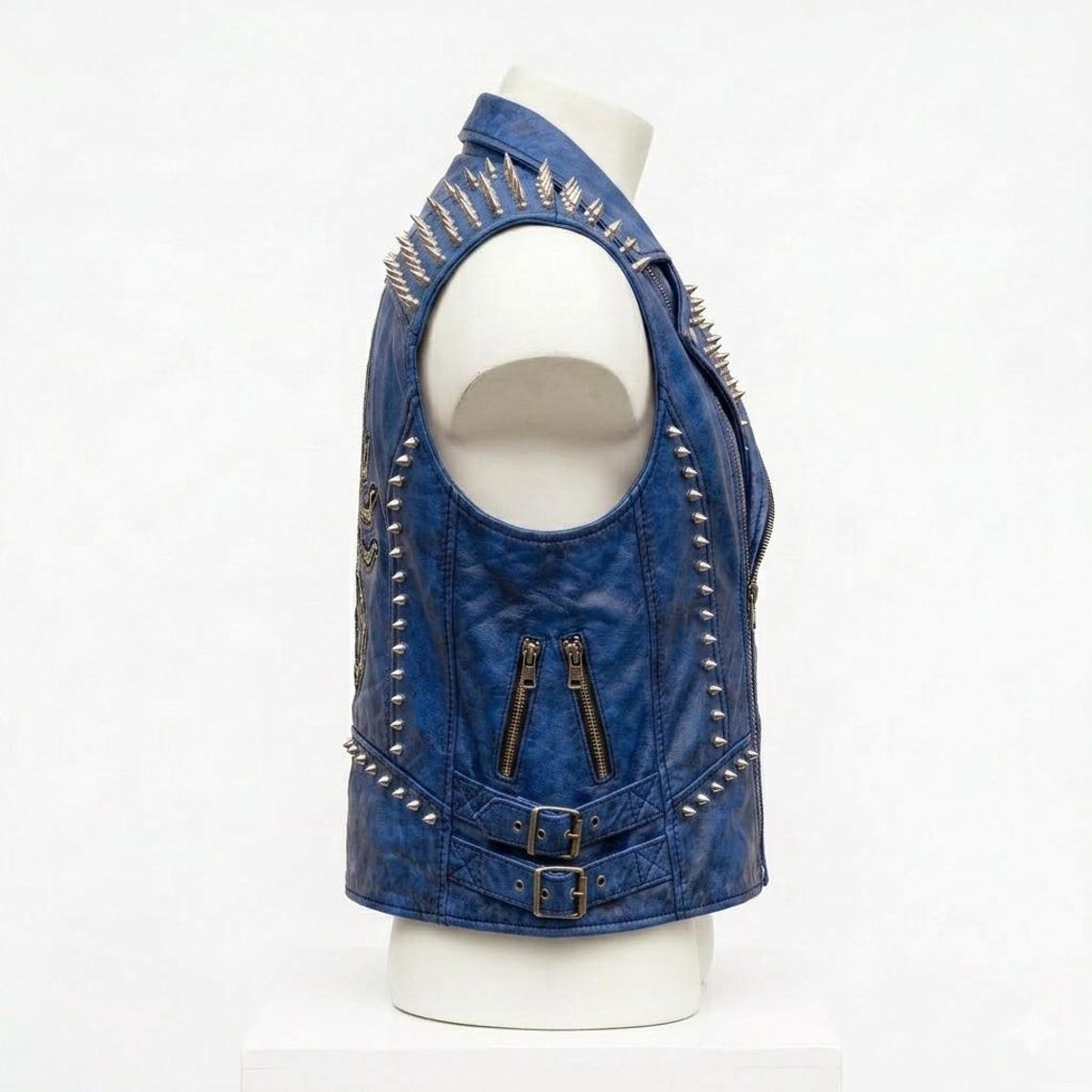 Side profile of men blue leather biker waistcoat with spike accent