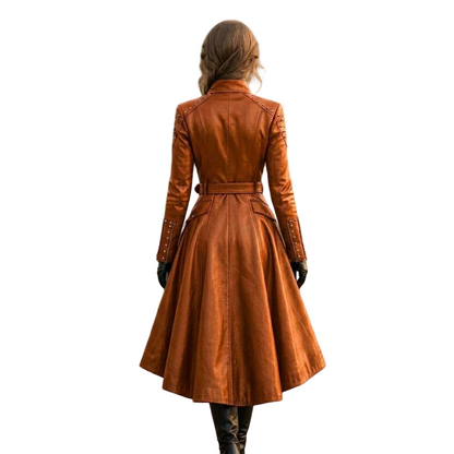 Back view of women's orange leather trench coat