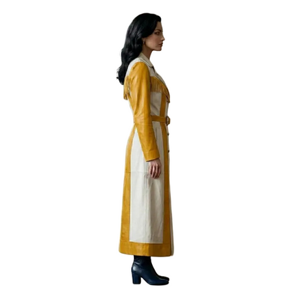 Side view of women's yellow white leather fringe trench coat with flowing fringe detail