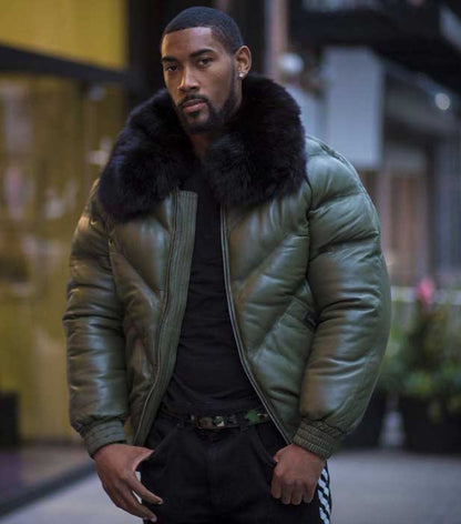 Close-up of removable black fox fur collar on olive jacket