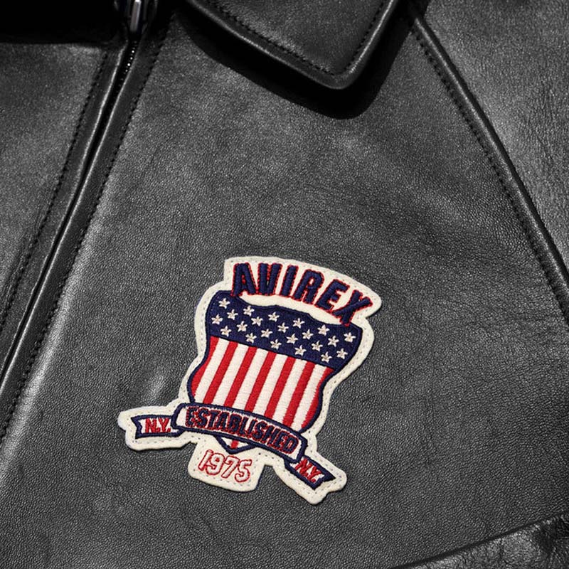 Men's black leather varsity jacket with front zip closure