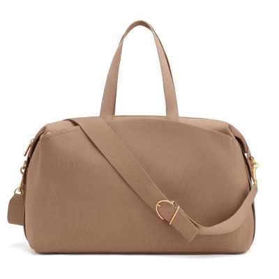 Beige duffel bag with a shoulder strap on a white background