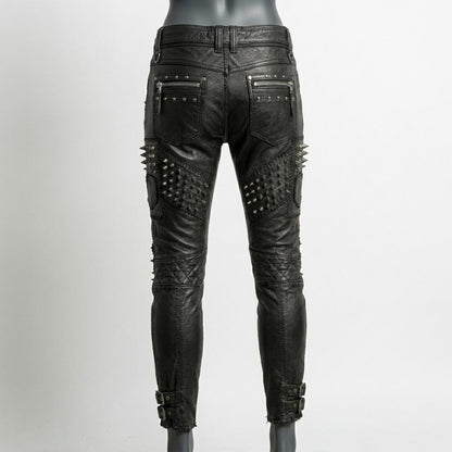  Back view of womens black studded leather pant highlighting sleek silhouette