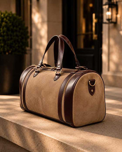 Brown leather carry on duffel bag with top handles