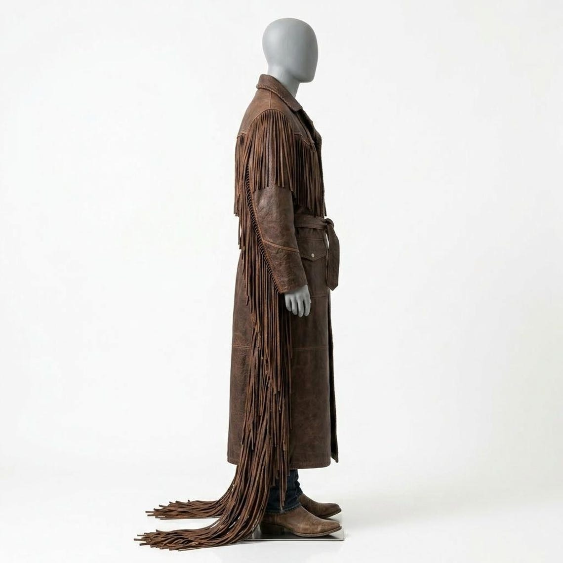 Side view of men brown fringe leather western duster coat with belt and long silhouette