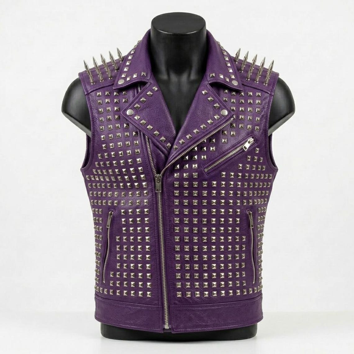 Front view of men purple leather biker vest with studded design