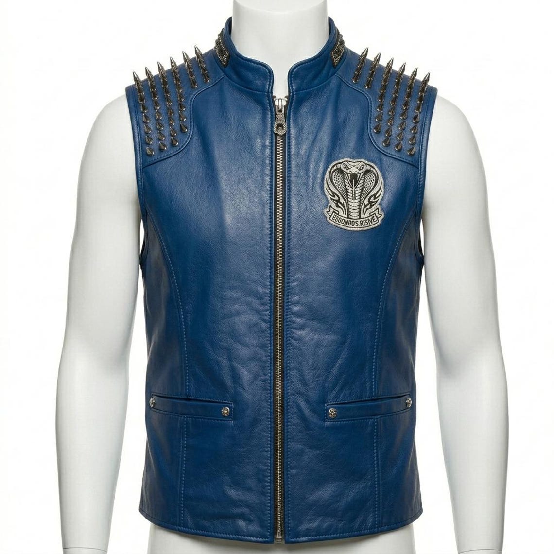 Front view of men blue leather biker vest with embroidered spike detail