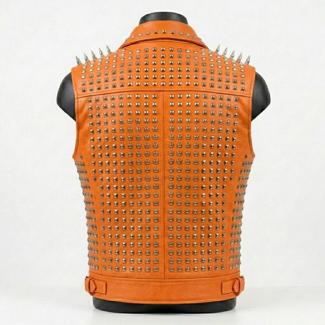  Back design of men orange leather vest with metal studs
