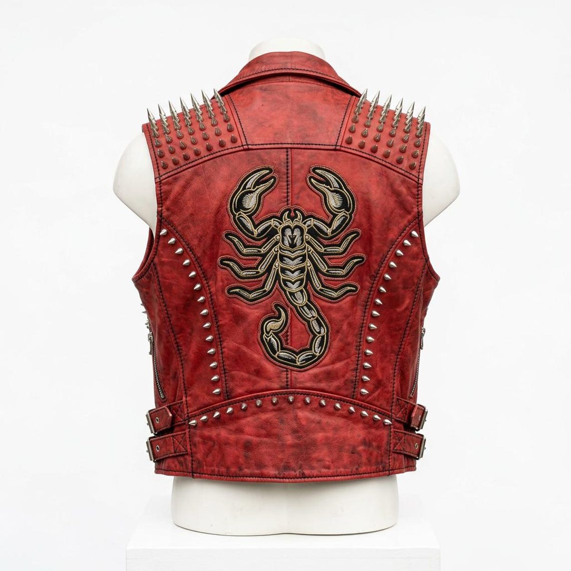 Back design of red leather biker vest with detailed embroidery