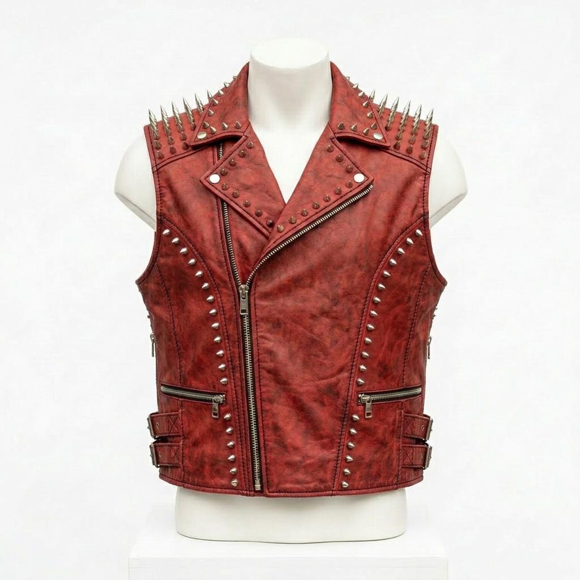 Front view of men red leather vest with gothic embroidery studs and spikes