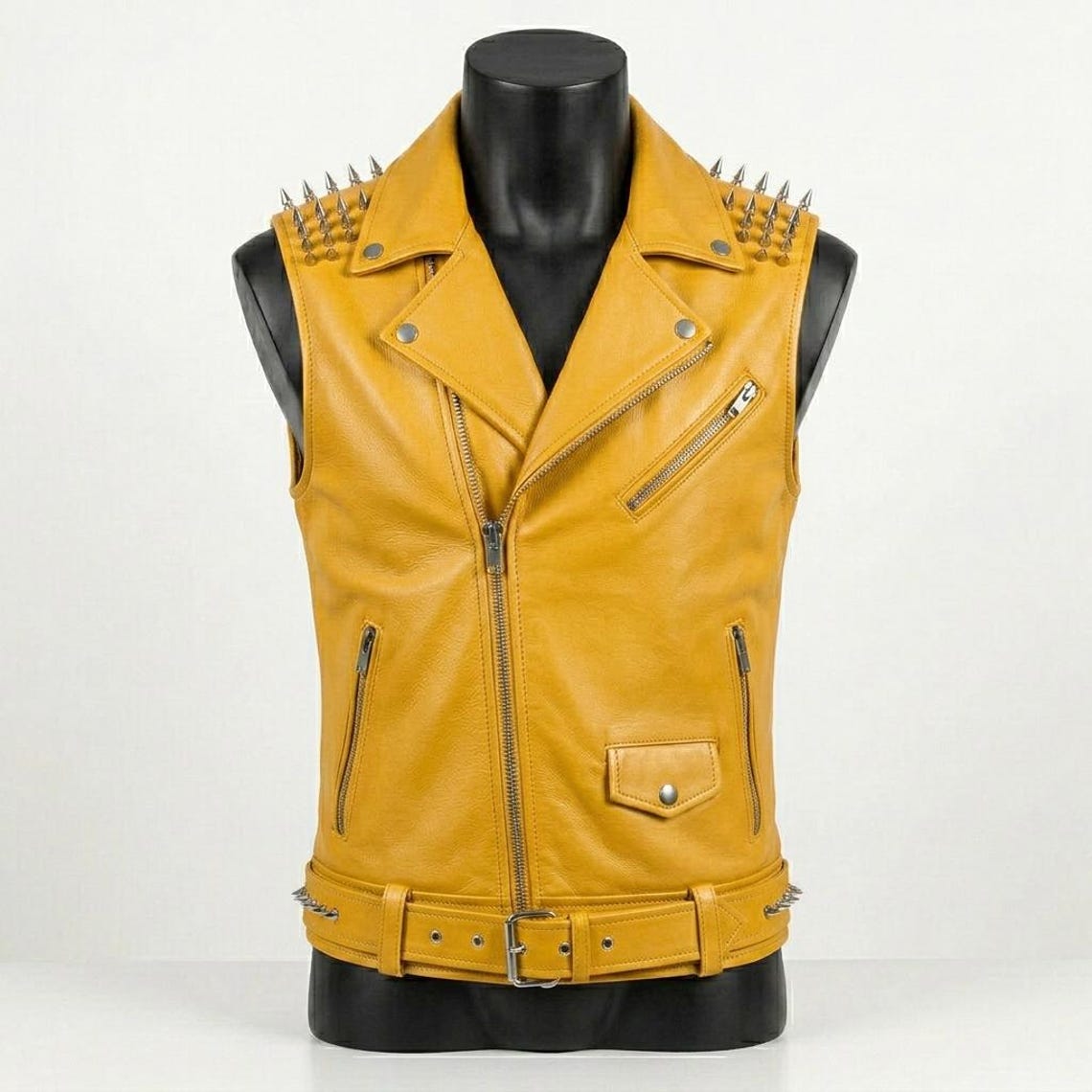 Front view of men yellow leather biker vest with skull patch and studded shoulder