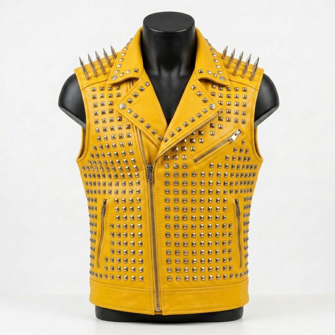 Front view of men yellow studded leather vest with metal spikes