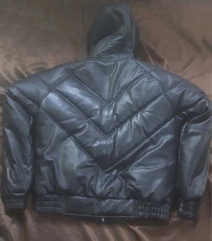 Men's black leather jacket showing zipper closure