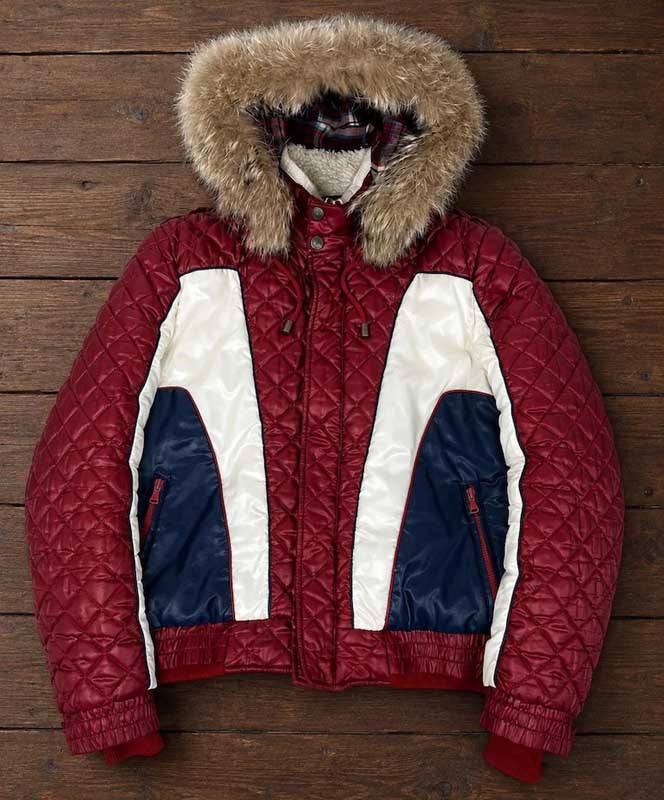 Men's burgundy quilted winter jacket with cream and navy color-block panels.