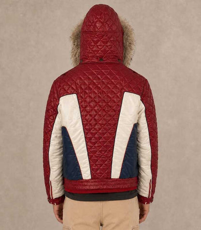Men's quilted winter jacket featuring a snap-button storm placket and front zipper.