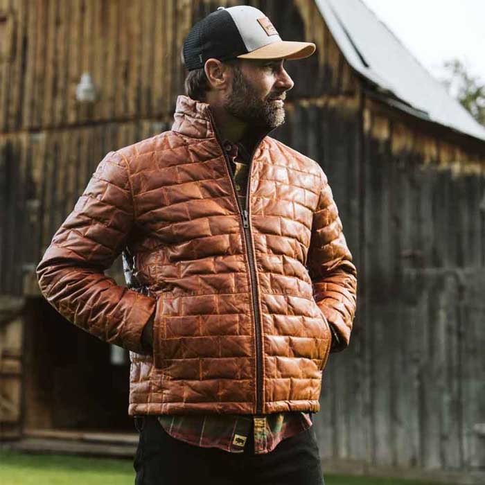 Close-up of leather puffer jacket funnel neck collar