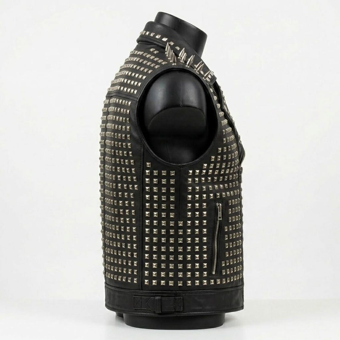  Side angle of gothic biker leather vest with metal studs