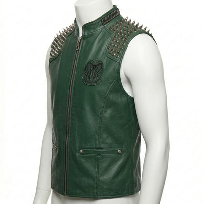 Side view of men’s green leather biker vest with spike accents and embroidered gothic detailing