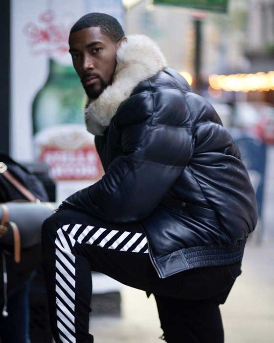 Navy lambskin bomber jacket with off-white fox collar