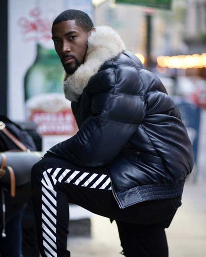 Navy lambskin bomber jacket with off-white fox collar