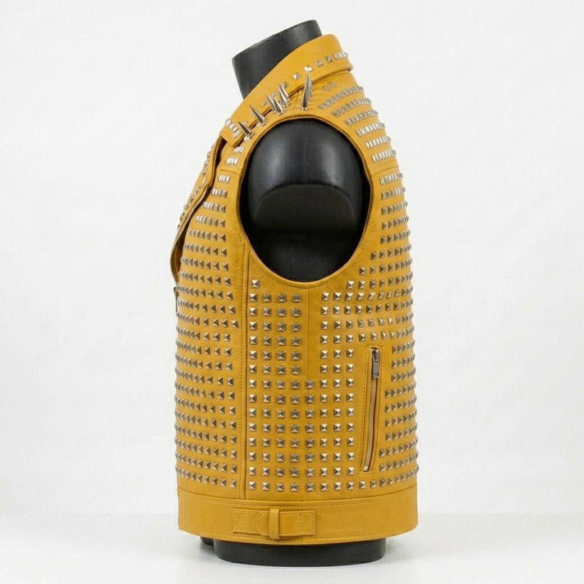  Side profile of men yellow motorcycle waistcoat with spikes