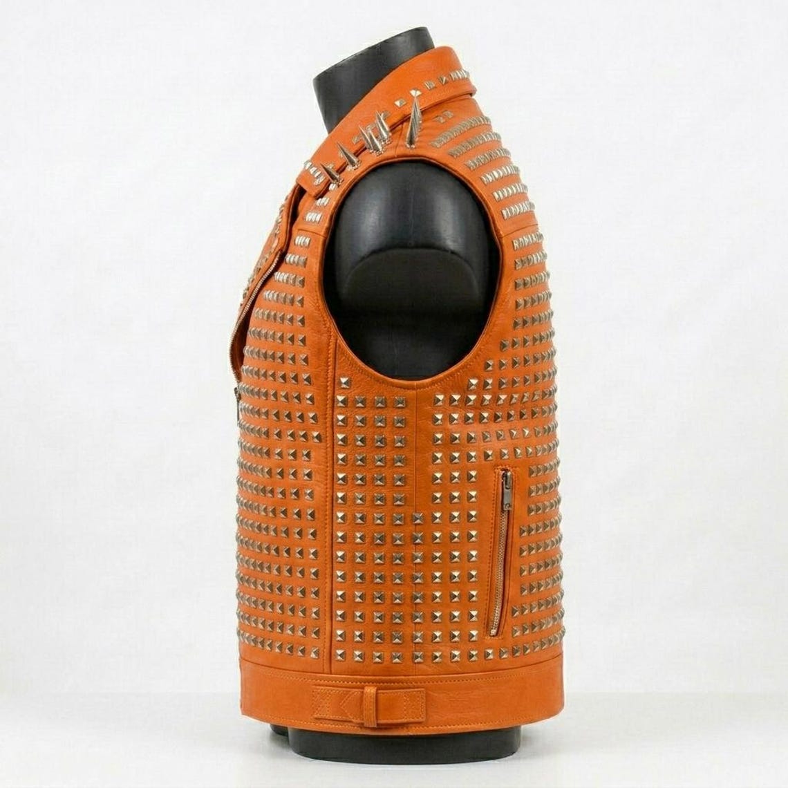Side profile of orange biker leather waistcoat for men