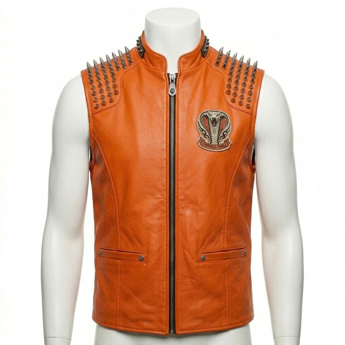 Front view of men orange leather biker vest with spikes and embroidery