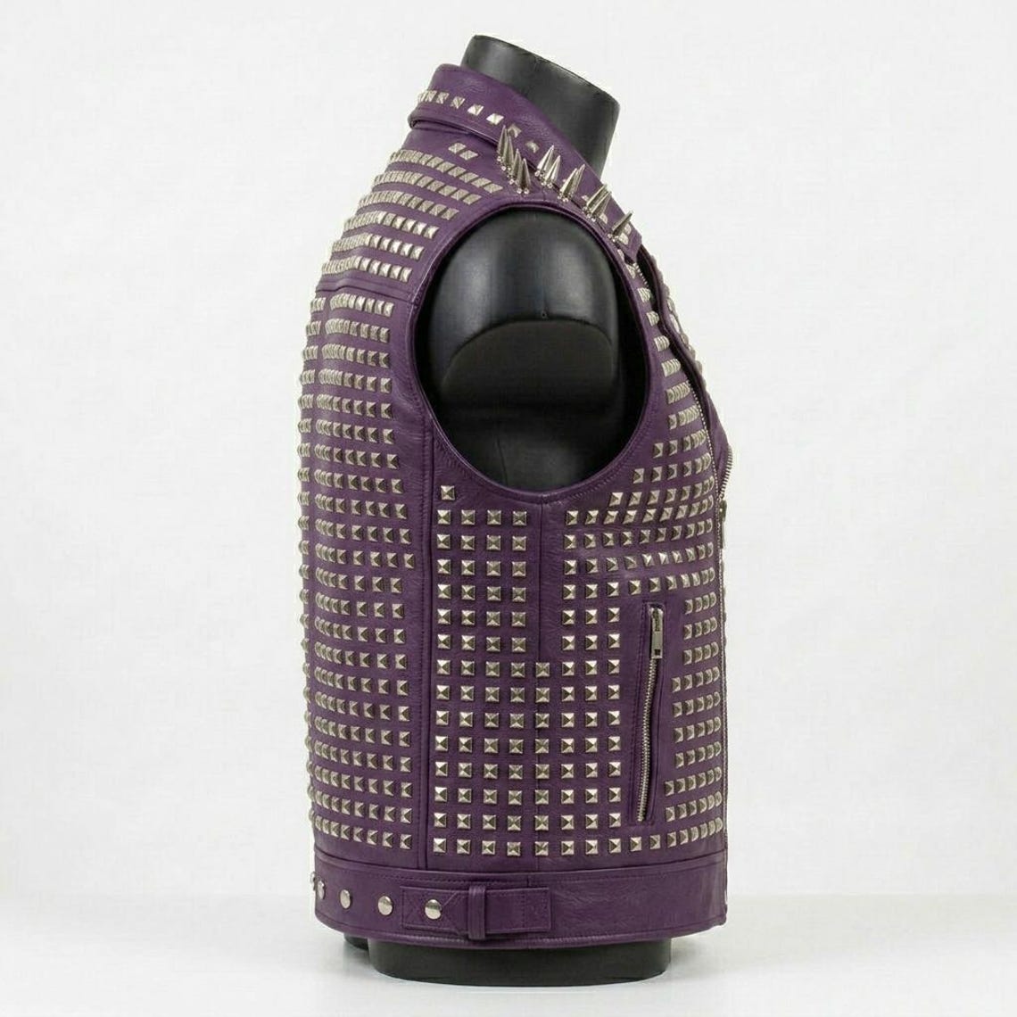 Side view of punk style purple leather biker vest