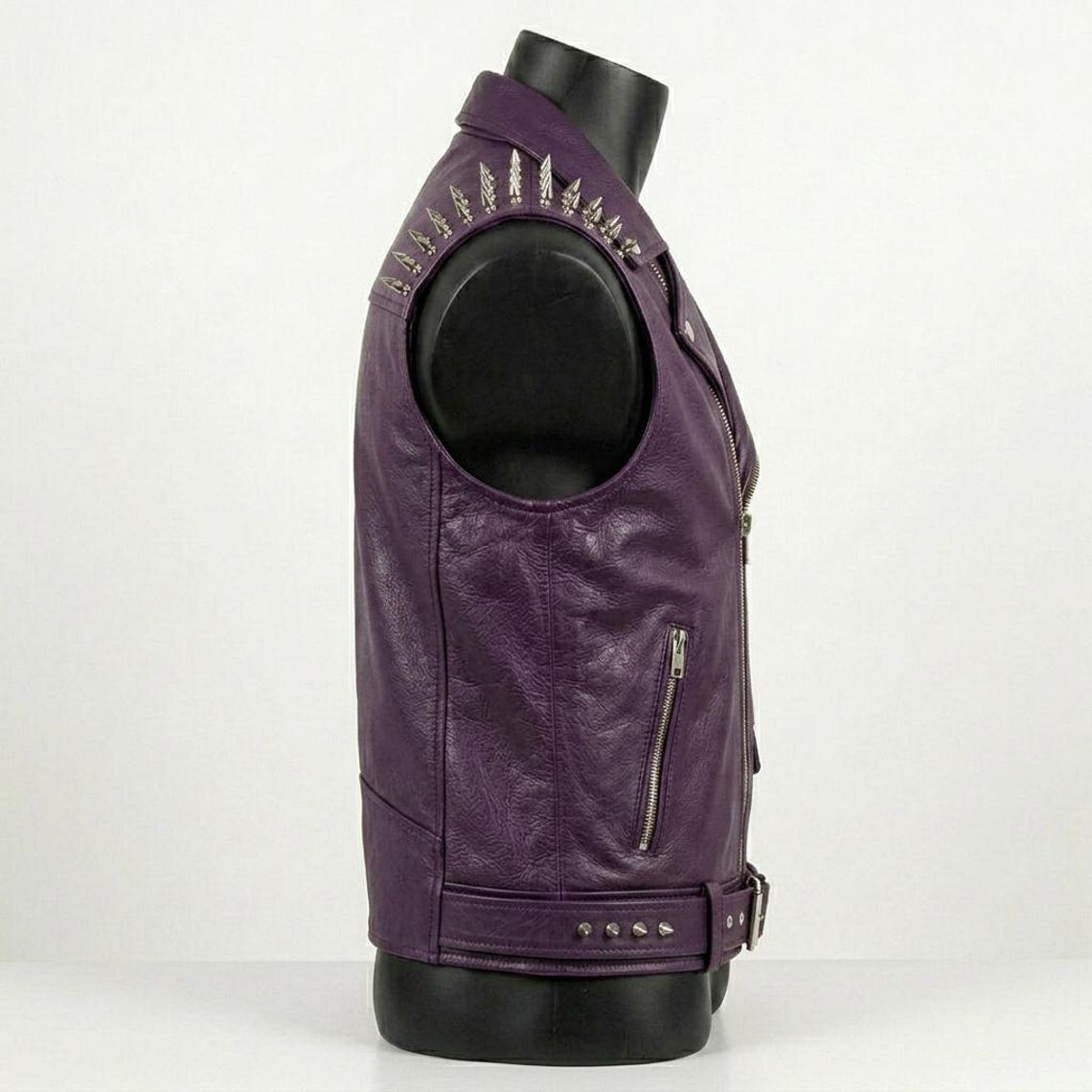Side profile of men purple leather biker vest for riding