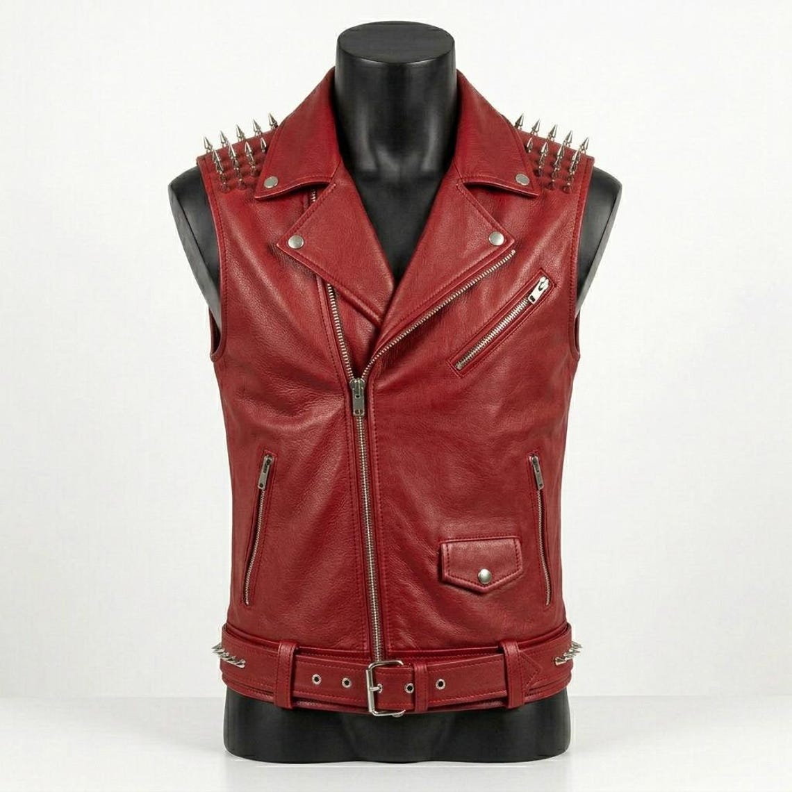 Front view of men red leather biker vest with skull patch and studded shoulder