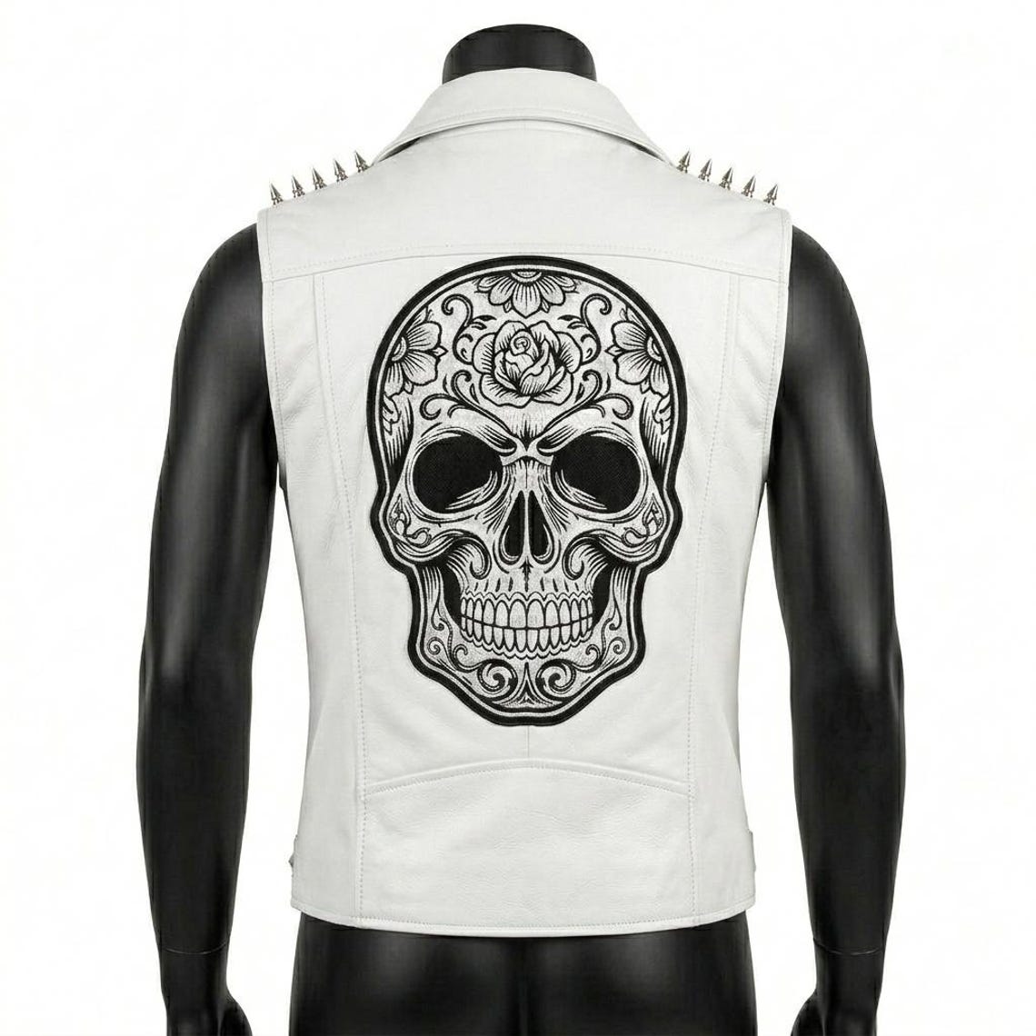 Back view of men’s white moto vest with skull patch design