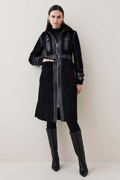 Women's black suede leather shearling coat with a longline silhouette
