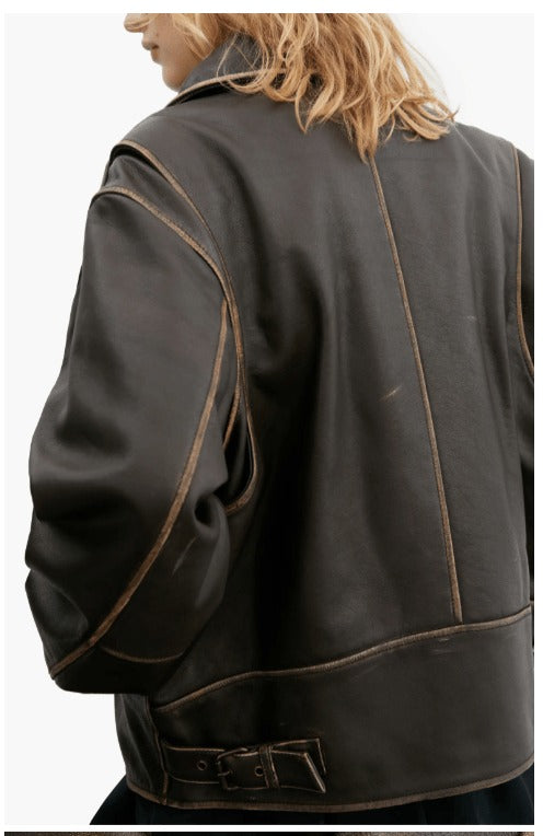 Women's distressed leather jacket with zipper pockets