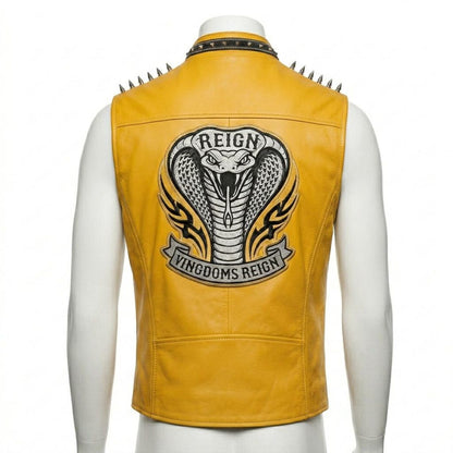 Back design of yellow leather biker vest with gothic embroidery